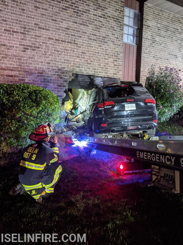 An SUV being pursued by the Police crashed into an apartment building in Aspen Manor.