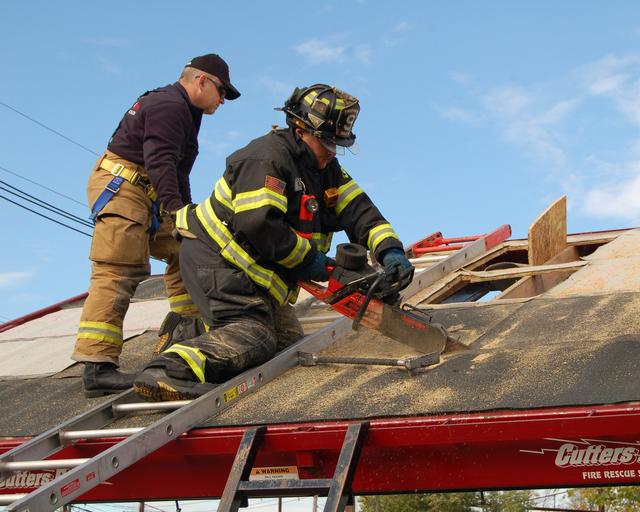 FF Williams uses the Cutters Edge saw at the vent drill, October 12, 2013.