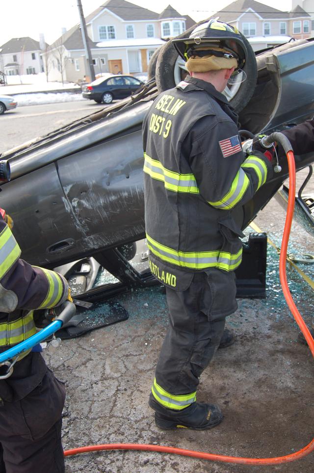 FF McPartland operates the jaws during extrication training February 13, 2011.