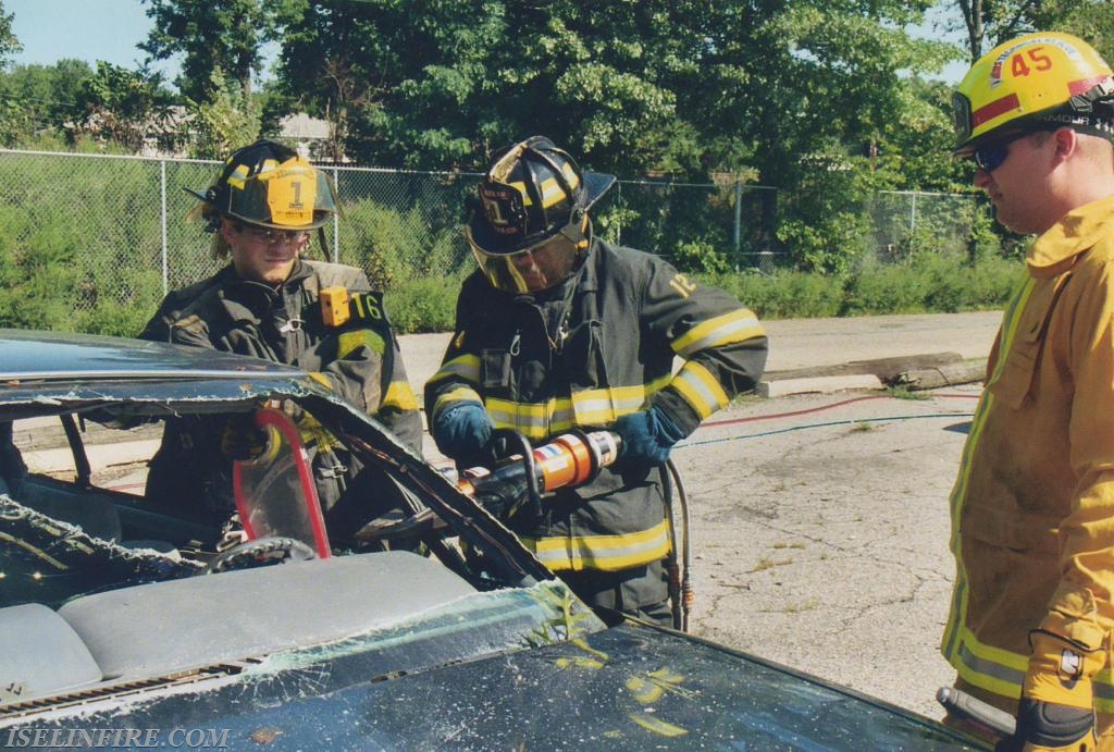 FF George Quattrone uses the cutter during extrication training, May 2005.