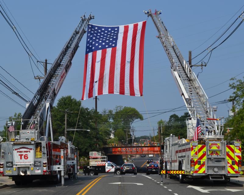 Woodbridge District 1 Truck 6 and Iselin District 11 Truck 11 at the funeral services for Ex-Chief Carl S. Christensen, september 3, 2015.