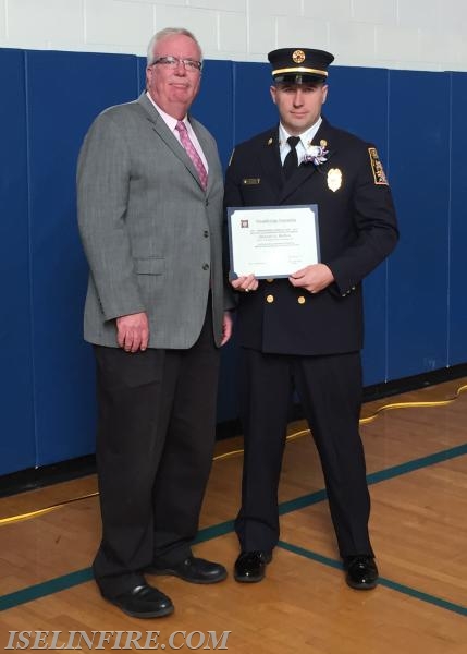 Ex-Chief Edward A. Mullen receives the Mayor's Volunteer Appreciation Award from Mayor McCormac, October 18, 2015.